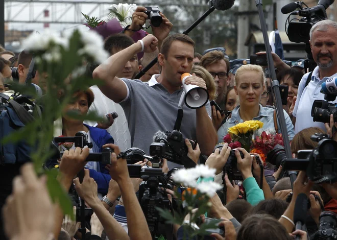 Zakonca Navalni sta (bila) seveda stalna udeleženca protestov proti ruskemu avtokratu Vladimirju Putinu in njegovemu vedno bolj skorumpiranemu režimu. FOTO: Sergej Karpuhin/Reuters