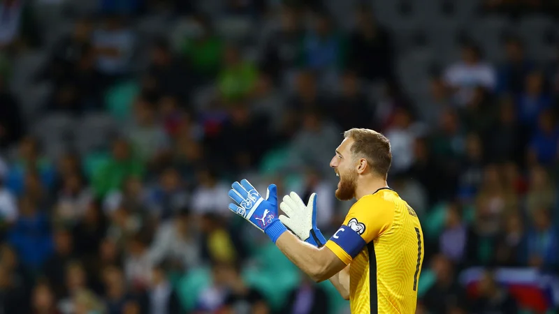 Fotografija: Jan Oblak (na fotografiji) med tekmo s Slovaško. FOTO: Borut Živulović/Reuters