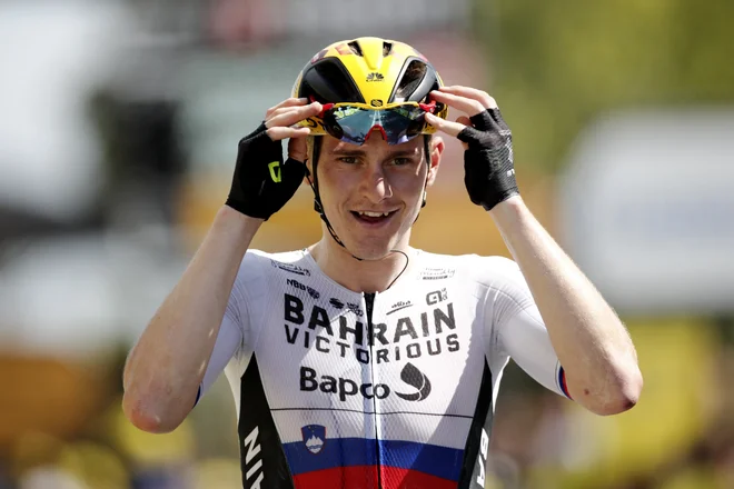 Matej Mohorič je še dopolnil sijajno kolesarsko slovensko poletje. FOTO: Benoit Tessier/Reuters