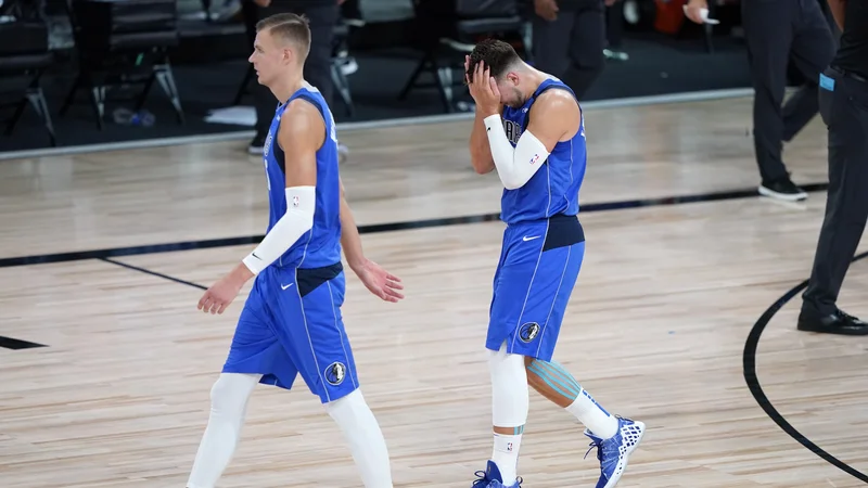 Fotografija: Jason Kidd bo moral poskrbeti, da bosta Luka Dončić (levo) in Kristaps Porzingis (levo) bolje sodelovala. FOTO: Ashley Landis/USA Today Sports