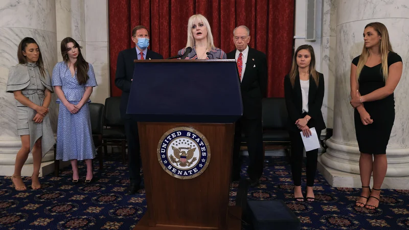 Fotografija: Članice ameriške gimnastične reprezentance v sredo na zaslišanju v ameriškem senatu. FOTO: Chip Somodevilla/AFP