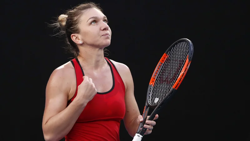 Fotografija: Simona Halep (na fotografiji) med nastopom v Melbournu leta 2018. FOTO: Issei Kato/Reuters