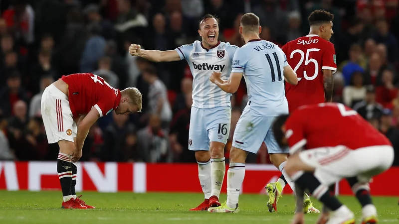 Fotografija: FOTO: Mark Noble in Nikola Vlašić proslavljata na Old Traffordu. Jason Cairnduff/Action Images