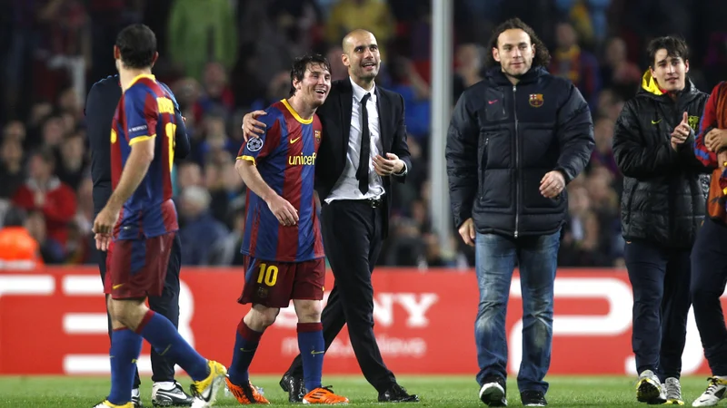 Fotografija: Guardiola in Messi sta že v prvem skupnem letu in pol v Barceloni osvojila vse lovorike, ki so bile na voljo. Argentinec se je razveselil tudi prve od šestih zlatih žog. FOTO: Action Images