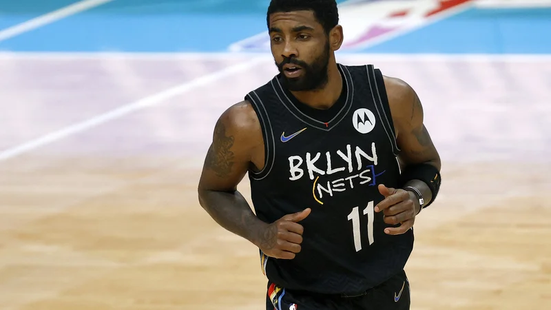 Fotografija: Kyrie Irving nasprotuje cepljenju. FOTO: Jared C. Tilton/AFP