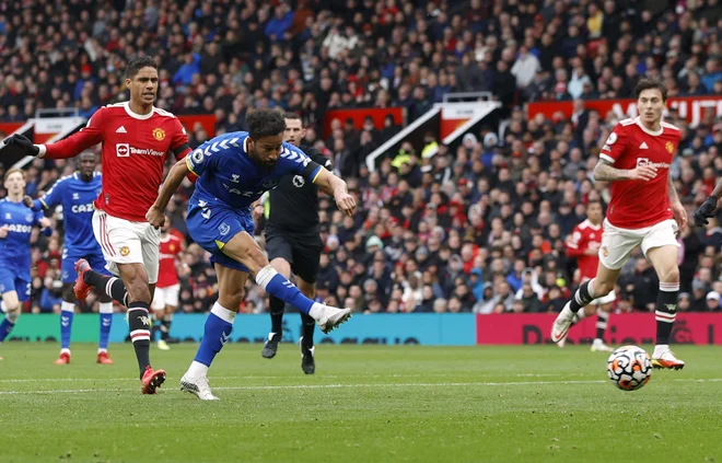 Andros Townsend je na Old Traffordu z zadetkom karamelam prinesel sladko točko. FOTO: Phil Noble/Reuters