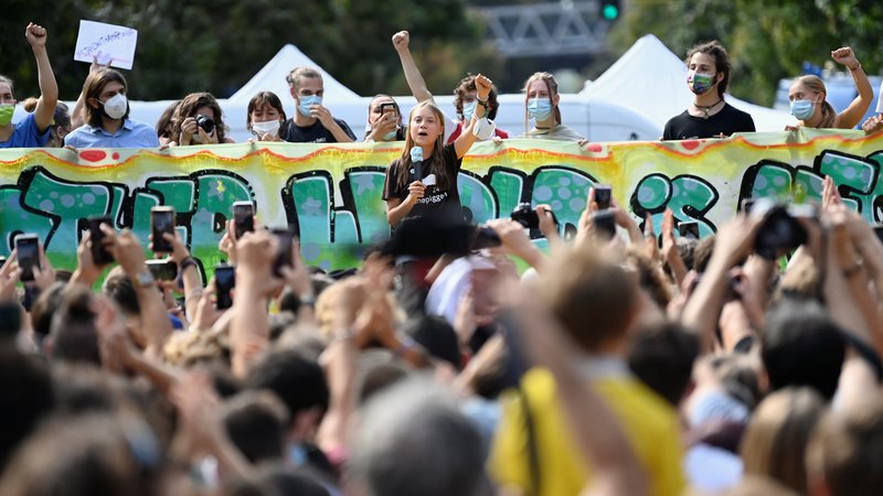 Fotografija: Švedska podnebna aktivistka Greta Thunberg je nagovorila mlade protestnike na podnebnem vrhu mladih v Milanu. FOTO: Flavio Lo Scalzo/Reuters