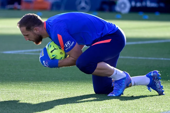 Jan Oblak in soigralci morajo v petek na Malti uloviti tri točke, če še hočejo upati na nastop na svetovnem prvenstvu. FOTO: Javier Soriano/AFP
