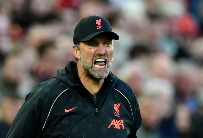 Jürgen Klopp se je cepil ne samo zase, ampak tudi zaradi drugih. FOTO: Peter Powell/Reuters