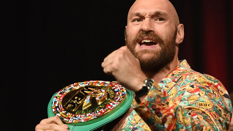 Fotografija: Tyson Fury je trdno odločen zadržati šampionski pas združenja WBC. FOTO: Robyn Beck/AFP