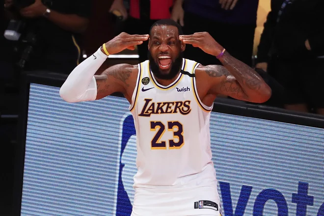 Košarkarski zvezdnik LeBron James je v ZDA nesporno najvplivnejša in najbolj občudovana športna osebnost. FOTO: Mike Ehrmann/AFP