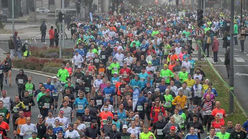 Fotografija: Tekaški praznik je na ulicah slovenske prestolnice zbral več kot 4000 ljubiteljev teka in rekreacije. FOTO: Blaž Samec