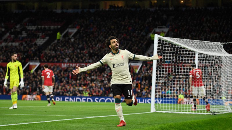 Fotografija: Mohamed Salah je na Old Traffordu zablestel s kar tremi zadetki. FOTO: Oli Scarff/AFP
