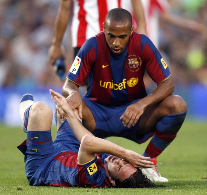 Thierry Henry in Lionel Messi septembra 2007. FOTO: Albert Gea/Reuters
