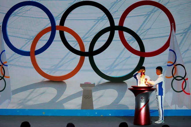 Olimpijski ogenj je že od prejšnjega tedna na prizorišču letošnjih iger. FOTO: Tingshu Wang/Reuters
