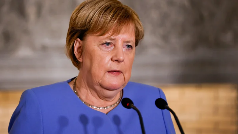 Fotografija: Angela Merkel je pred leti v Grčiji večljala za eno najbolj osovraženih žensk. FOTO: Alkis Konstantinidis/Reuters
