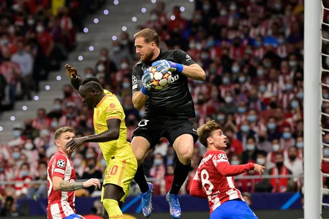 Atleticov Jan Oblak bo proti Liverpoolu znova na zahtevni preizkušnji.

FOTO: Javier Soriano/AFP
