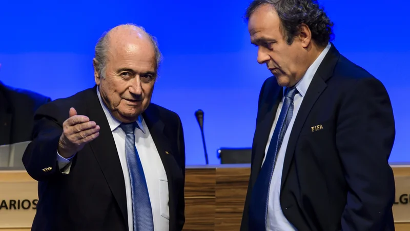 Fotografija: FIFA president Joseph Blatter (L) talks to UEFA president Michel Platini during the 64th FIFA congress on June 11, 2014 in Sao Paulo, on the eve of the opening match of the 2014 FIFA World Cup in Brazil. AFP PHOTO/FABRICE COFFRINI [avtor:COFFRINI FABRICE] Foto Fabrice Coffrini Afp - International News Agency

