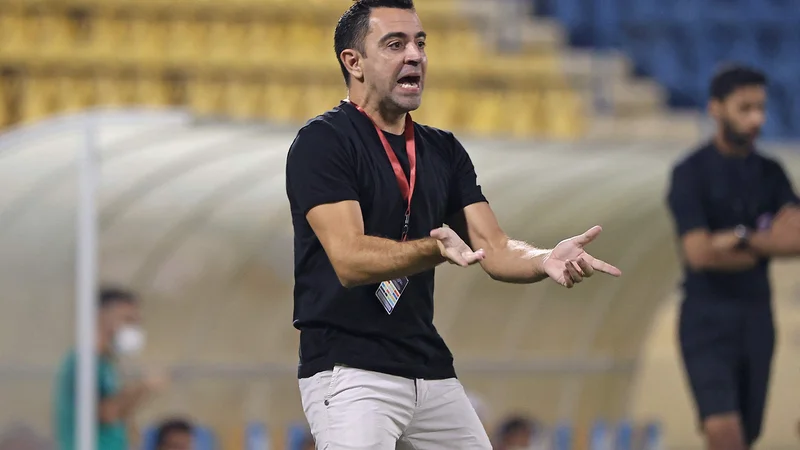 Fotografija: Kdaj se bo Xavi Hernandez vrnil v Barcelono in začel zdravljenje katalonskega nogometnega velikana, je le še stvar dneva ali ur. FOTO: Karim Jaafar/AFP
