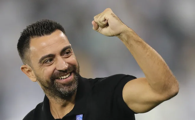 (FILES) In this file photo taken on October 01, 2019 Sadd&#39;s coach Xavi Hernandez reacts after a goal during the first leg of the AFC Champions League semi-finals football match between Qatar&#39;s Al Sadd and Saudi&#39; Al Hilal at the Jassim bin Hamad Stadium in the Qatari capital Doha. - Barcelona are set to announce Xavi Hernandez&#39;s dramatic return to the club as coach, after Al Sadd confirmed on November 5, 2021 a deal has been agreed between the clubs. Al Sadd said in a statement Barca have paid the release clause for Xavi, who has been coaching in Qatar since 2019 and now rejoins the club where he enjoyed such incredible success as a player. (Photo by Karim JAAFAR/AFP) Foto Karim Jaafar Afp
