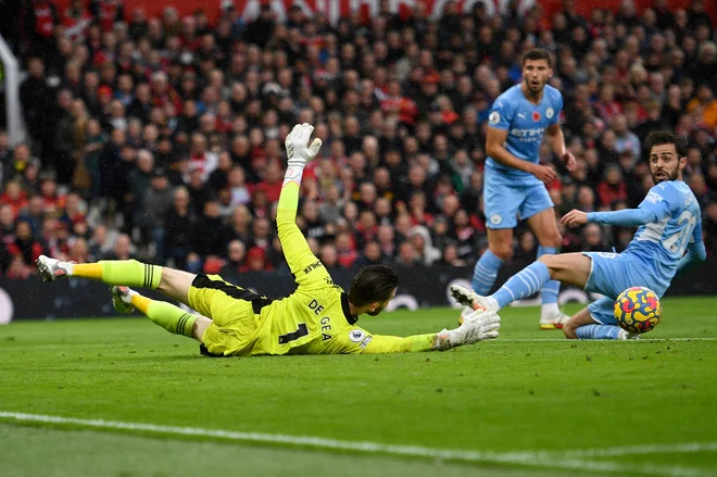 Vratar rdečih vragov David De Gea je preprečil še hujši poraz Uniteda v mestnem derbiju proti Cityju. FOTO: Oli Scarff/AFP
