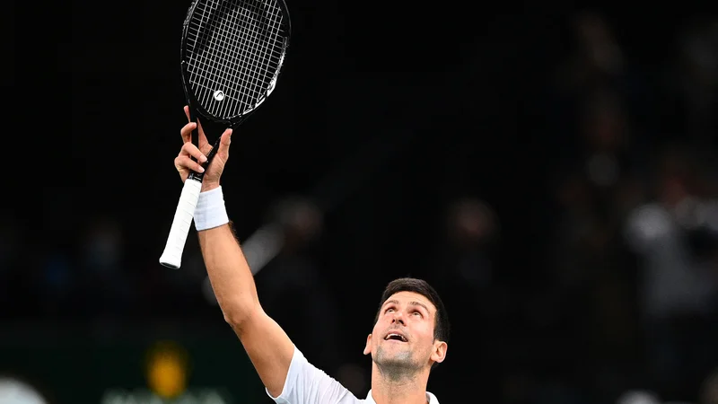 Fotografija: Novak Đoković ne da teniškega prestola. FOTO: Christophe Archambault/AFP