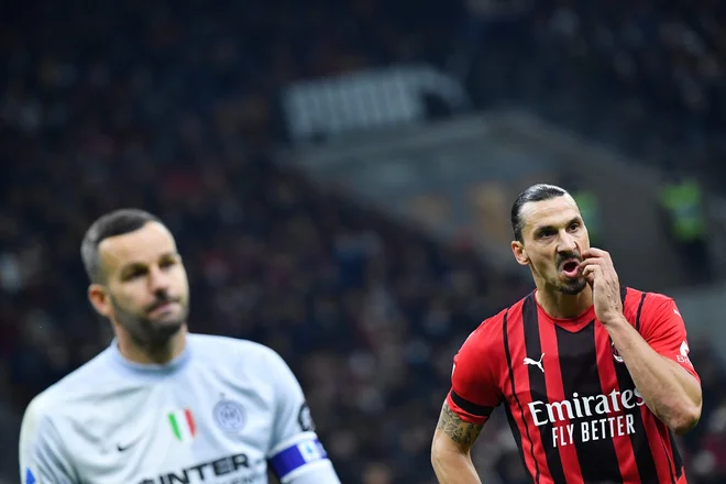 Samir Handanović se je izkazal z nekaj dobrimi posredovanji, tudi po strelih Zlatana Ibrahimovića (oba na fotografiji). FOTO: Tiziana Fabi/AFP
