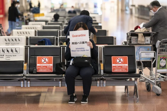 ZDA danes znova odpirajo meje za vse potnike iz tujine, ki so cepljeni proti covidu-19. FOTO: Charly Triballeau/AFP
