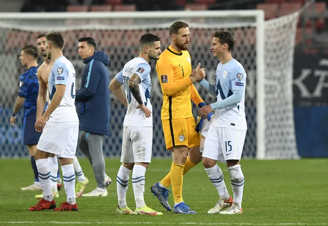 Jan Oblak ni mogel preprečiti izenačujočega gola Slovakov. FOTO: Radovan Stoklasa/Reuters
