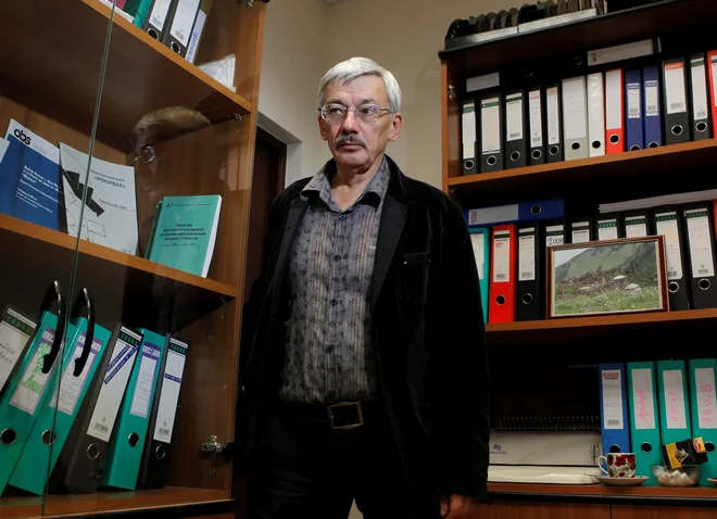 Oleg Orlov in njegovi sodelavci pri Memorialu so v šoku, po drugi strani pa jih zahteva tožilcev ne preseneča. FOTO: Maksim Šemetov/Reuters
