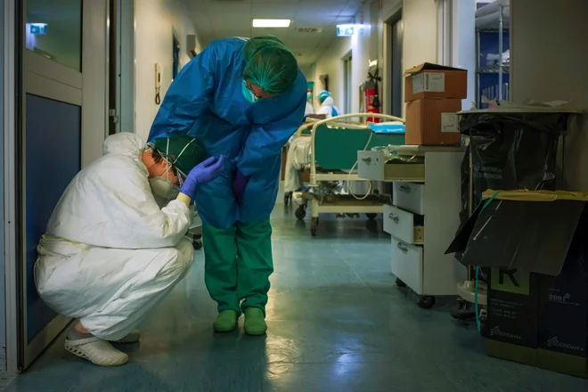 Ekipa medicincev iz Italije prihaja na pomoč. FOTO: Paolo Miranda/AFP
