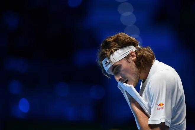 Stefanos Tsitsipas je že moral končati z igranjem v Torinu. FOTO: Marco Bertorello/AFP
