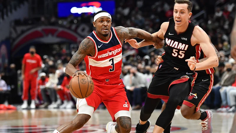 Fotografija: Bradley Beal (levo) in Duncan Robinson. FOTO: Brad Mills/Usa Today Sports
