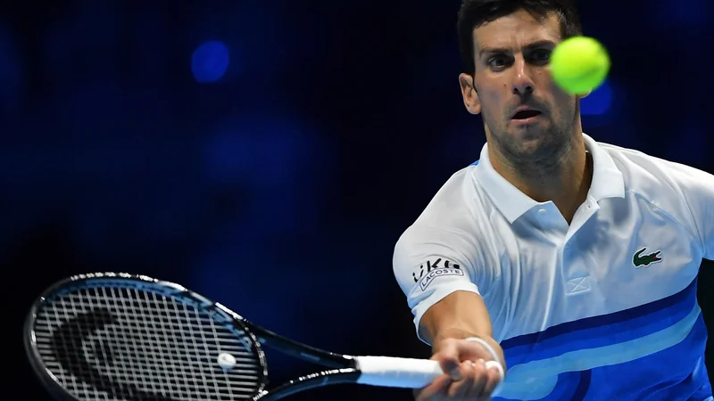 Fotografija: Novak Đoković med zadnjim dvobojem z Aleksandrom Zverevom. FOTO: Marco Bertorello/AFP
