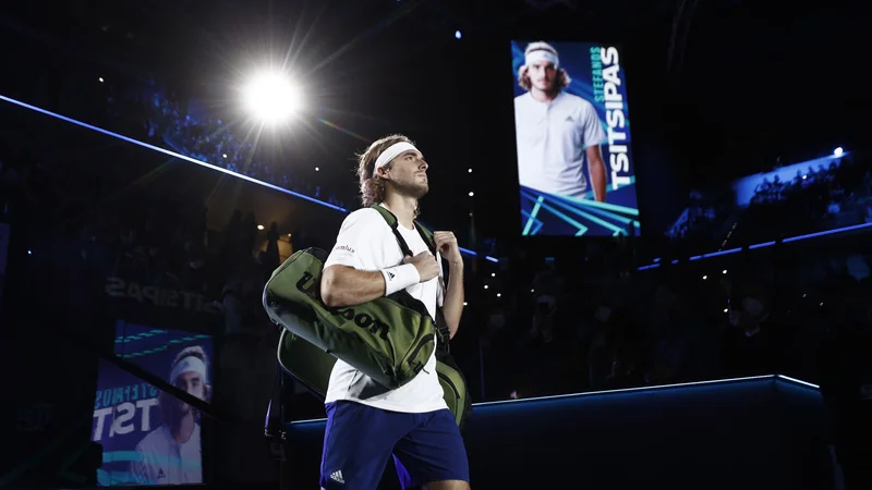 Fotografija: Stefanos Tsitsipas si je rad vzel dolge premore za stranišče. FOTO: Guglielmo Mangiapane/Reuters