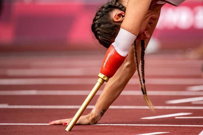 Avgust 2021. Poljakinja Alicja Jeromin se pripravlja tek na 100 m v kategoriji - T47 na paraolimpijskih igrah v Tokiu. FOTO: Philip Fong/Afp