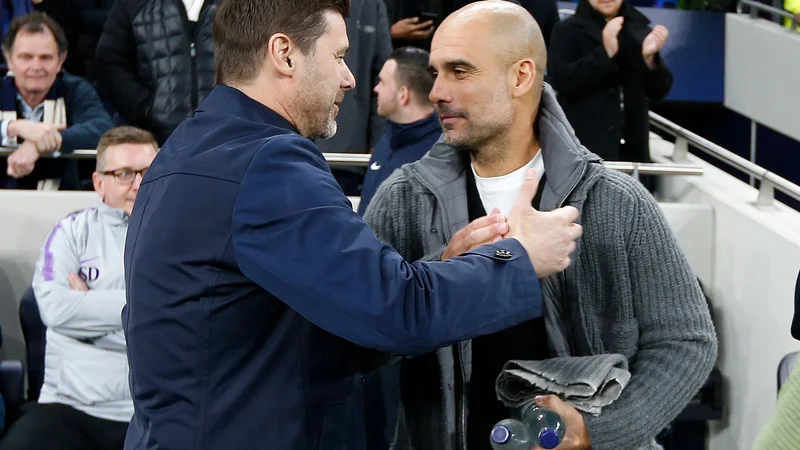 Fotografija: Mauricio Pochettino (levo) in Josep Guardiola sta bila v določenem obdobju svojih karier blizu prevzema Manchester Uniteda. FOTO: Ian Kington/AFP
