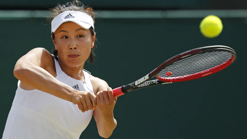 Fotografija: Usoda kitajske teniške igralke Peng Shuai še danes ni povsem jasna in nedvoumna. FOTO: Adrian Dennis/AFP