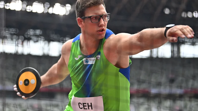 Fotografija: Kristjan Čeh med enim od metov diska v Tokiu. FOTO: Ben Stansall/AFP