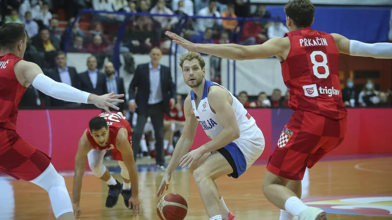 Fotografija: Jaka Blažič je z dobrimi reprezentančnimi predstavami razveselil tudi svojega klubskega trenerja Jurico Golemca. FOTO: Jože Suhadolnik(DElo
