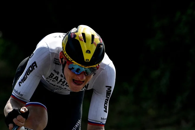 Matej Mohorič med 19. etapo letošnje dirke po Franciji. FOTO: Philippe Lopez/AFP
