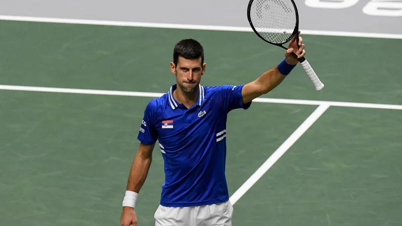 Novak Đoković bo, kot kaže, popustil pred izzivom, in izpolnil zahteve avstralskih oblasti za vstop v državo ter se podal v lov za 21. veliki slam na odprtem prvenstvu Avstralije v Melbournu. FOTO: Oscar Del Pozo/AFP