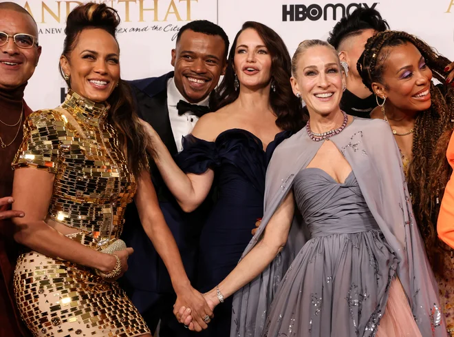In tako se zgodba nadaljuje v nekoliko drugačni zasedbi: Nicole Ari Parker, Kristin Davis, Sarah Jessica Parker in Karen Pittman na rdeči preprogi ob premieri nadaljevanja serije Seks v mestu. FOTO: Caitlin Ochs/Reuters
