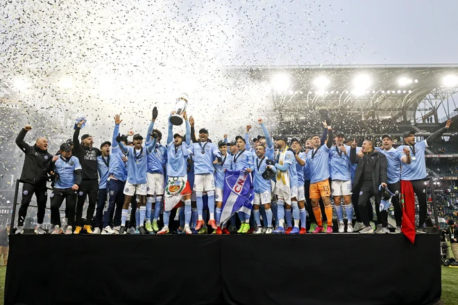 Prvi naslov ameriškega prvaka v nogometu so pri New York City FC bučno proslavili, saj so ga povrhu osvojili na gostujočem terenu v Portlandu. FOTO: Soobum Im/Usa Today Sports
