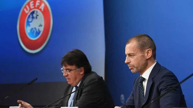 Fotografija: Predsednik Uefe Aleksander Čeferin in njen generalni sekretar Theodore Theodoridis po zadnji seji izvršnega odbora. FOTO: Reuters