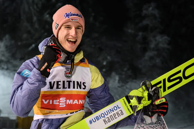 Karl Geiger se je veselil druge zmage v tej sezoni. FOTO: Fabrice Coffrini/AFP
