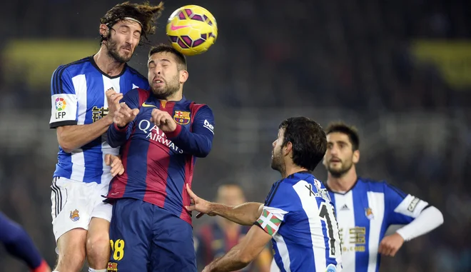 Esteban Granero (levo v letu 2015, ob njem Jordi Alba) je nekaj let preživel tudi v majici Reala Sociedada. FOTO: Vincent West/Reuters
