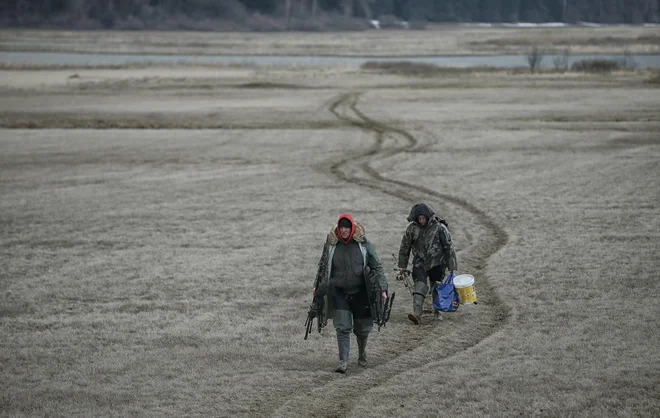 Utrinek iz Cerkniškega jezera 20. marca 2021. FOTO: Blaž Samec/Delo