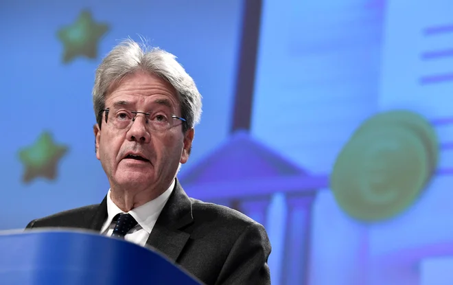 Kot je napovedal Gentiloni, bo evropska komisija poleti prihodnje leto predlagala drugo direktivo za izvajanje prvega stebra sporazuma, potem ko bo podpisana ustrezna večstranska konvencija. FOTO: John Thys/AFP
