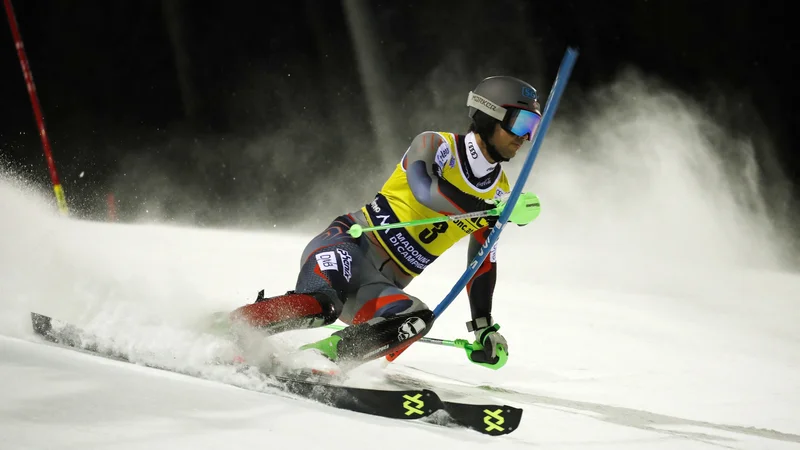 Fotografija: Sebastian Foss-Solevaag na poti do zmage v Madonni di Campiglio. FOTO: Alessandro Garofalo/Reuters
